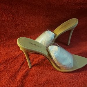 Never been worn, nude mules, size 11 shoes